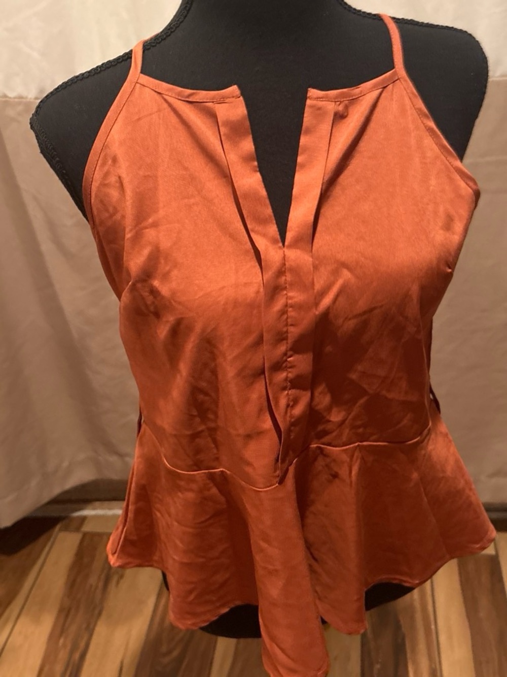 Sleeveless Rust Peplum Blouse with Split Front